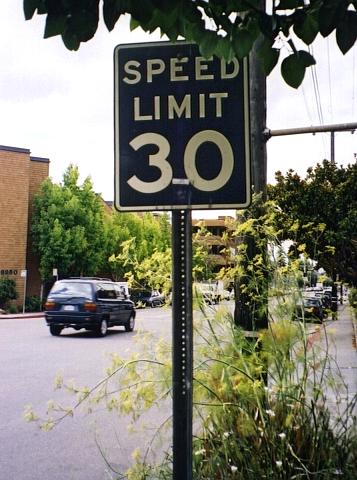 White on black speed-limit sign