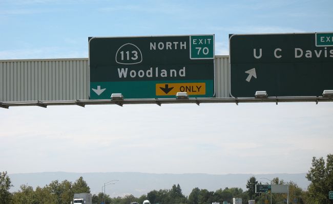 Button-reflector sign with an exit number off Interstate 80 near Davis