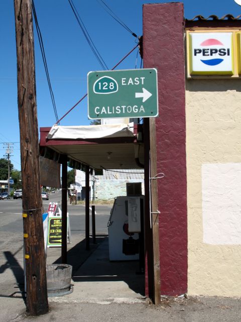 California 128 directional sign in downtown Geyserville