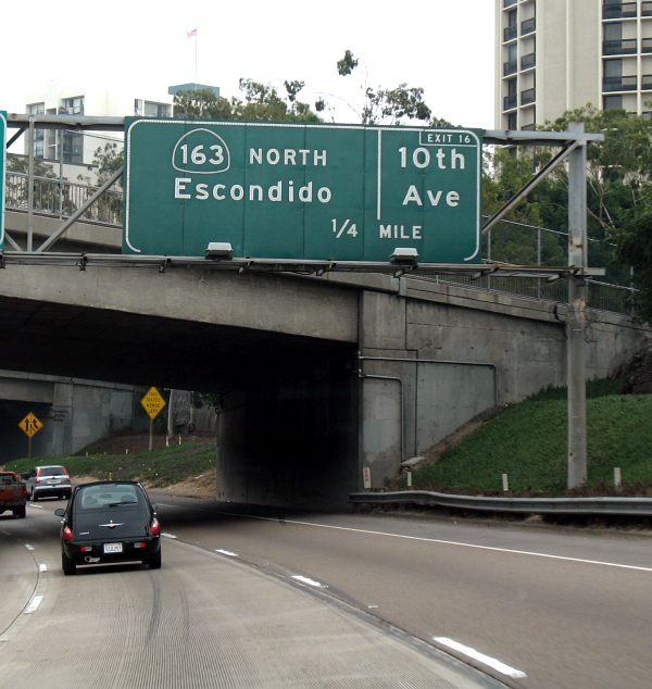 Retrofitted and tiny exit number indicator on Interstate 5 southbound in San Diego