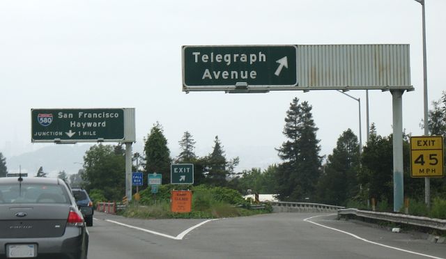 Telegraph Avenue exit and Interstate 580 interchange advance signs in Oakland