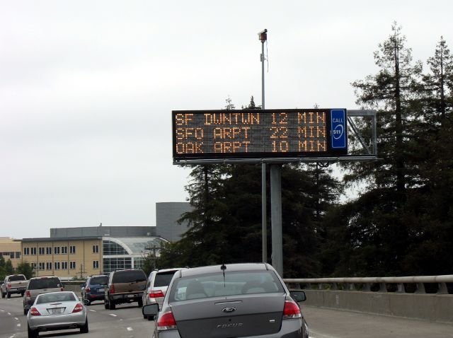 Variable message sign with travel times on California 24 in Oakland