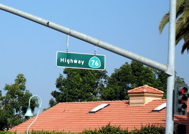 California 76 shown as a cross street on a signal mast arm in Oceanside