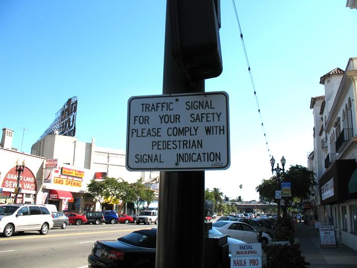 Pedestrian warning on Grand Avenue in Oakland, California