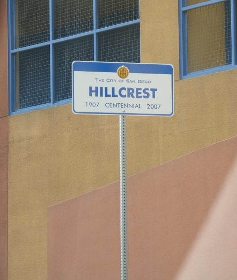 City sign commemorating a neighborhood's 100th anniversary