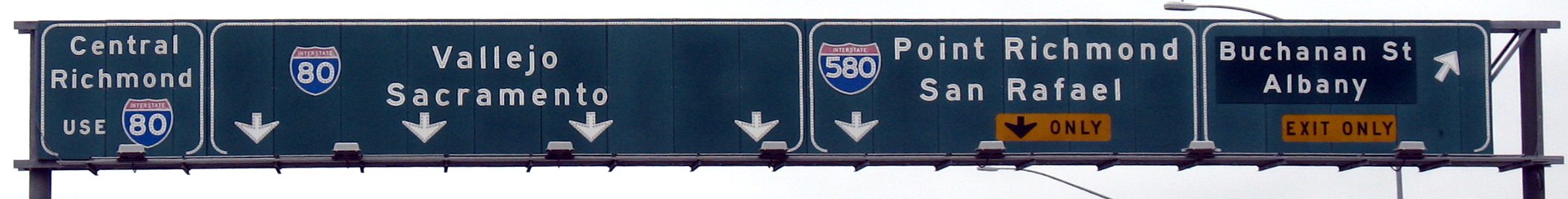 Close-ups of the signs at the I-80/I-580 split at the concurrence's northern end in Albany, California