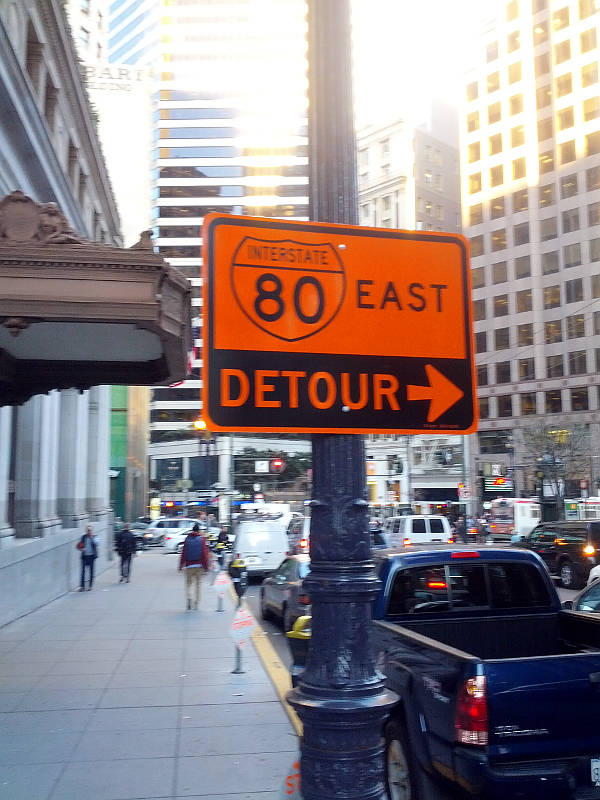 Orange detour marker on Post Street in San Francisco (2014)
