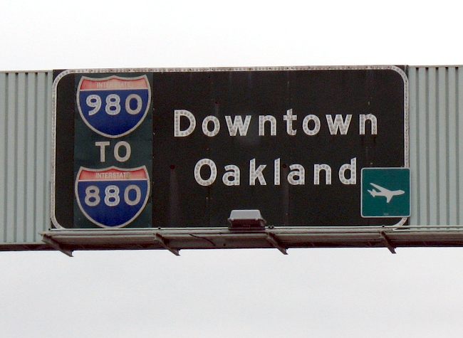 Close-up of Interstate 980 sign with button reflectors in Oakland