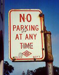 Old parking regulation sign in Pacific Grove, California