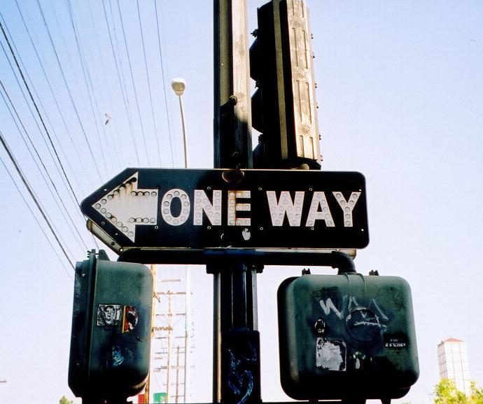 Button reflectors on one-way sign in San Diego