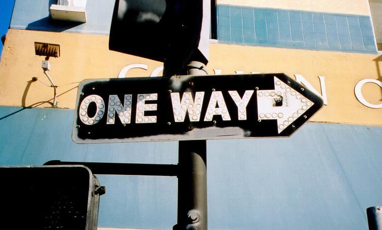 Button reflectors on one-way sign in San Diego