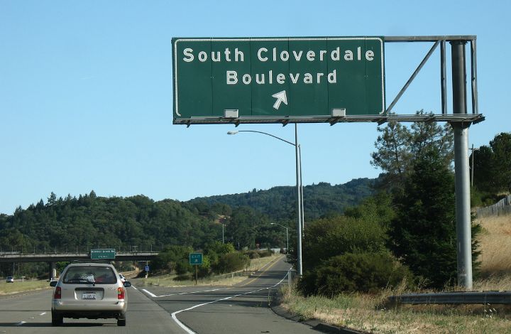 Button reflectors on US 101 exit sign in Cloverdale, California