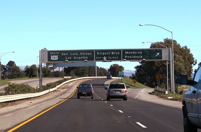 Sign gantry on US 101 southbound in Salinas, showing the next large cities farther south on the route