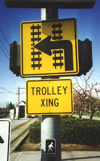 Warning sign in San Jose, California for light rail track