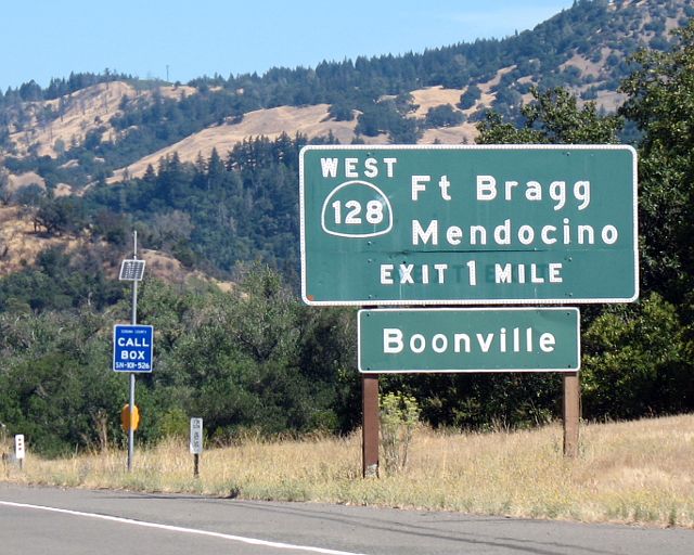 Shadows from earlier lettering on the advance exit sign for California 128 on US 101 northbound