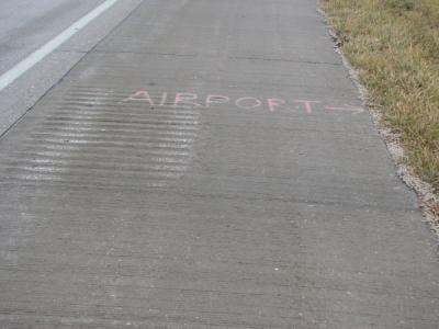 Placement instructions for Springfield, Mo. airport sign on US 60