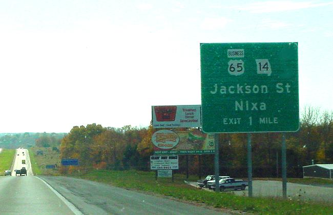 Business banner for exit sign from US 65 in Ozark, Mo.