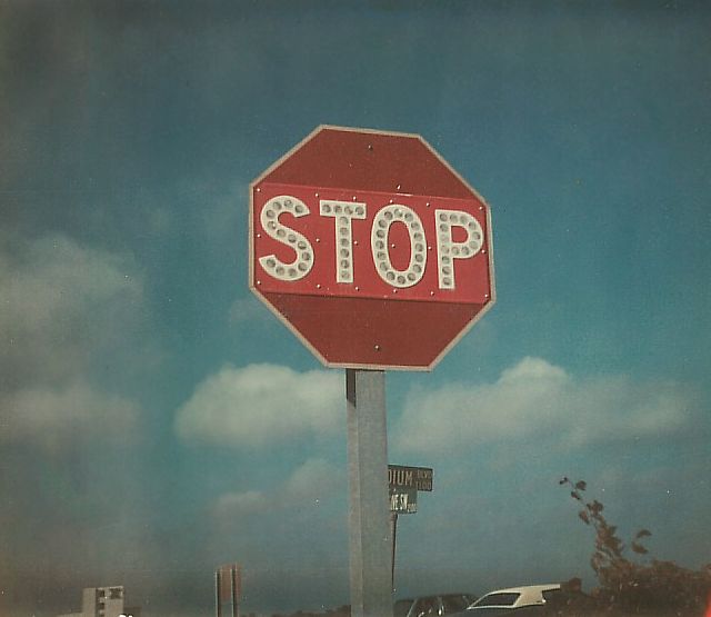 Button reflectors on STOP sign at freeway entrance in Columbia, Mo. (1978)
