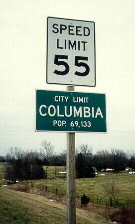 Columbia, Mo. city limit sign with 1990 census figures