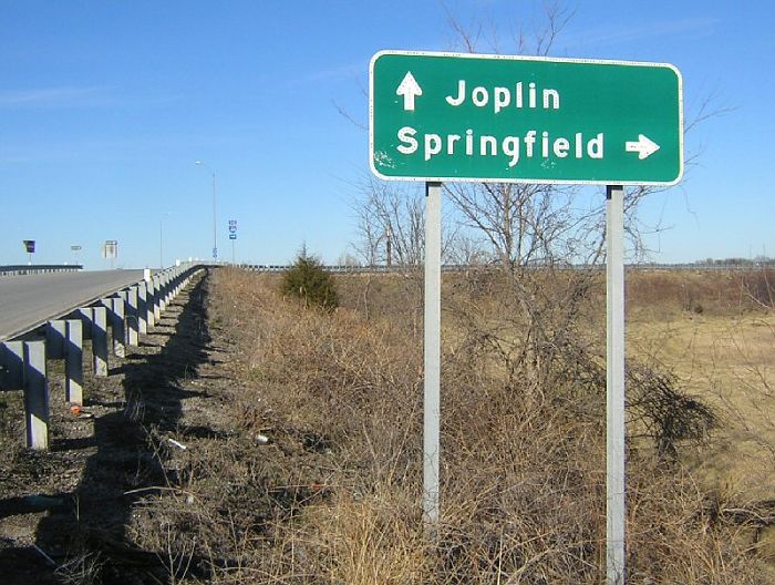 Button reflectors on destination sign for Interstate 44 near Joplin, Mo.