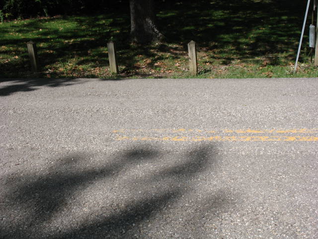 End of center stripe at the end of MoDOT maintenance of Missouri 128