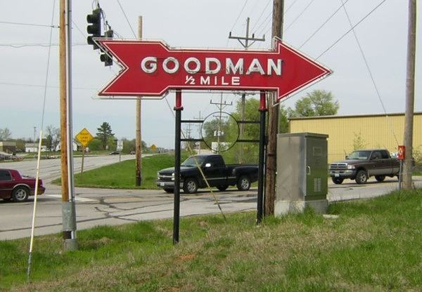Neon sign pointing the way to Goodman, Mo.
