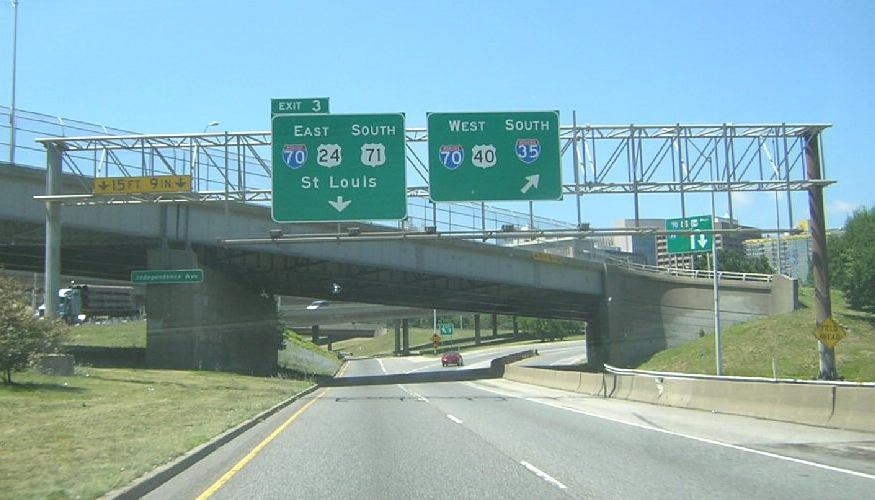 Sign for exits on the downtown freeway loop in Kansas City, Mo.