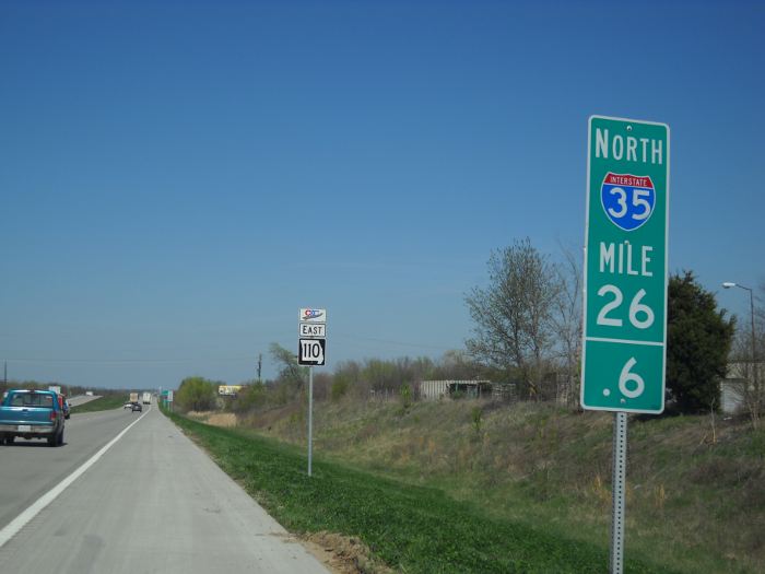 Missouri 110 marker with Interstate 35 mile marker in Kearney