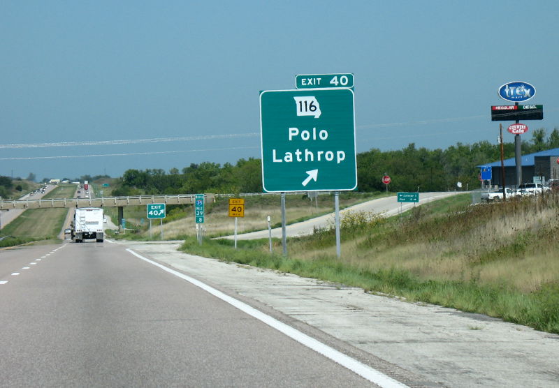 Exit for Missouri 116 from Interstate 35 in Clinton County