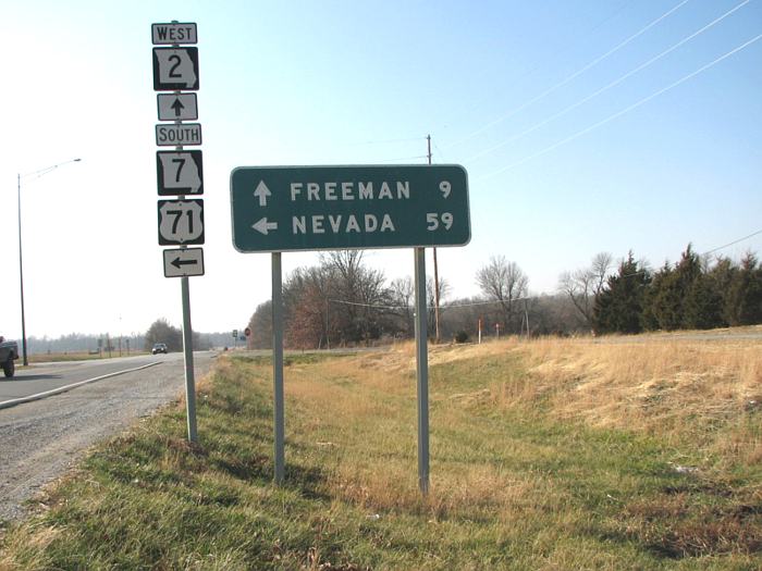 Button reflectors on directional sign near Harrisonville, Mo.