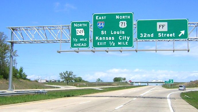 Signs for approach Missouri 249 on US 71 near Joplin