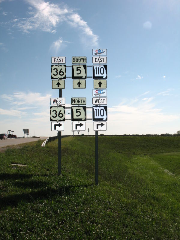 Markers for MO 5 and US 36/MO 110 on MO 11 in Brookfield