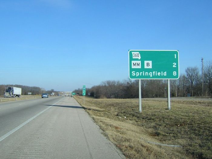 Miniature markers on destination sign on Interstate 44 in Greene County 