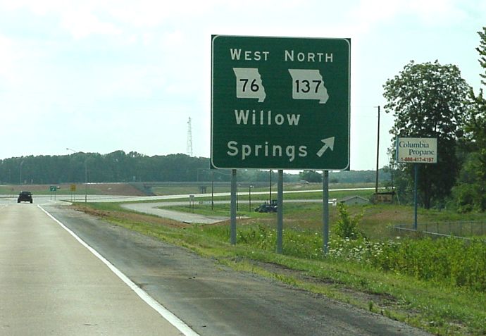 Missouri 76 and Missouri 137 interchange with US 60 on the southwest side of Willow Springs