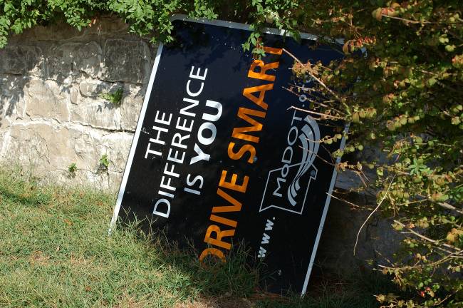 A 'Drive Smart' sign, found on the ground in Hermann, Mo.