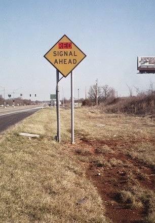 Warning sign for red traffic lights upcoming on Missouri 13 north of Springfield