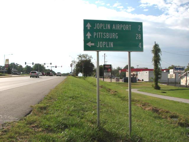 Narrower-than-usual font for a destination sign on Business US 71 in Webb City