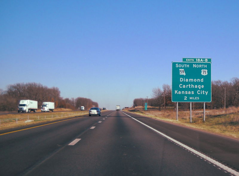 No I-49 shield on big green sign in Jasper County, Mo.