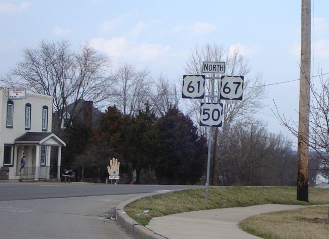 US 50 erroneously added to US 61/67 sign assembly in St. Louis County, Mo.