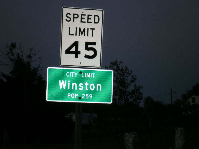 Winston, Mo. city limit sign, taken at night
