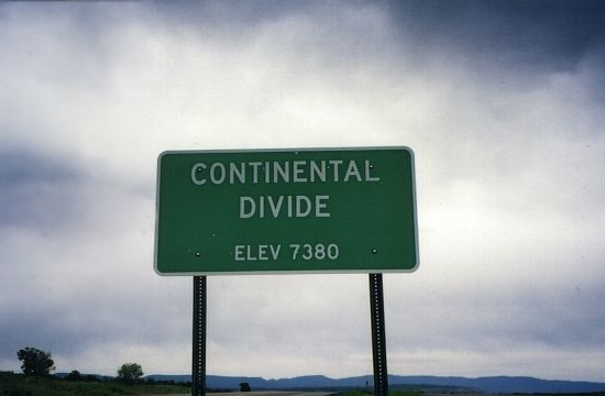 Highway marker for Continental Divide on US 550 in NM