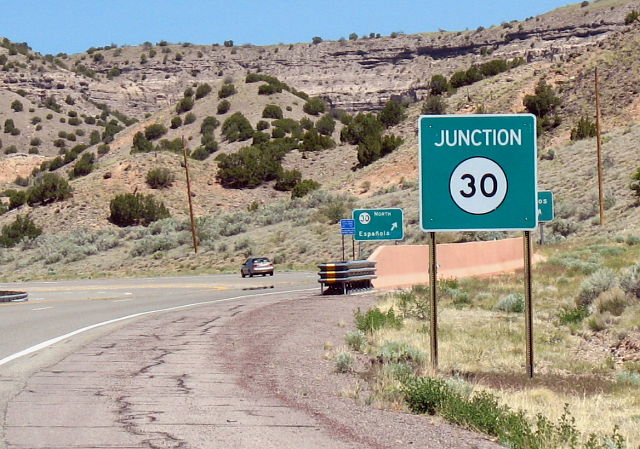 Single-panel junction sign for NM 30 at NM 502
