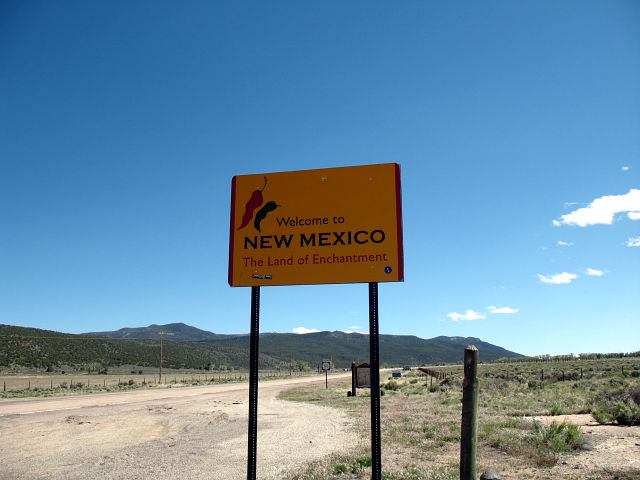 Welcome sign on southbound NM 522 in Taos County