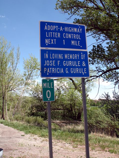 Adopt-a-highway sign on NM 442 in Mora County