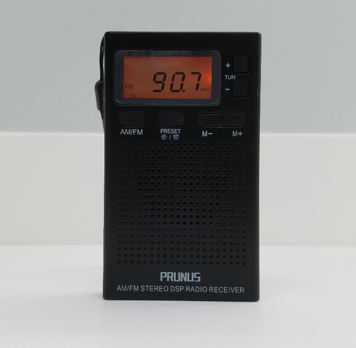 Prunus J-125 AM/FM radio, tuned to KALX(FM)