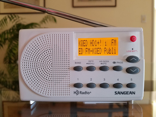Front view of Sangean SG-108 AM/FM HD DSP radio, tuned to KQED-FM