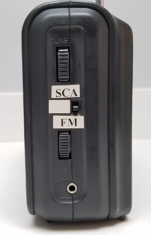 Side of Sony ICF-38 radio, showing the SCA switch