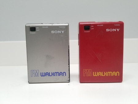 Both silver and red versions of the Sony SRF-30W FM Walkman