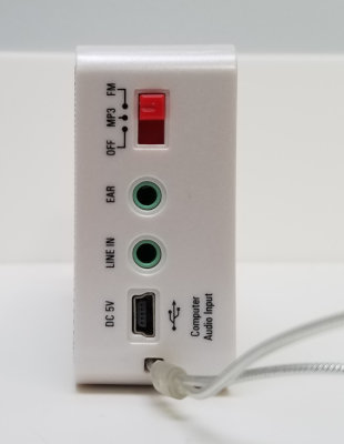 The right side of the Tecsun ICR-100, showing input/output jacks, etc.