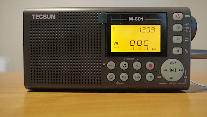 Tecsun M-601 FM radio/audio player/recorder, shown tuned to 99.5 KQMT in Denver, Colorado